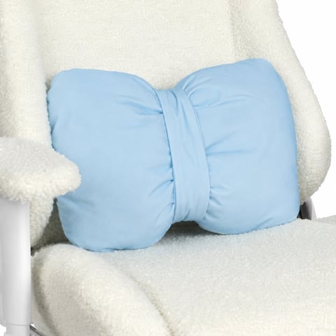 Pair of blue hand warmers or mittens resting on a cream-colored knit sweater and chair